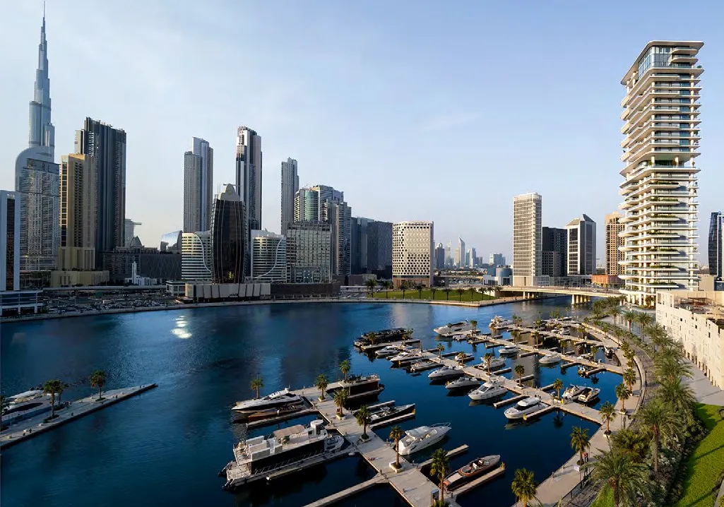 Marasi Bay marina with VELA and the Burj Khalifa skyline