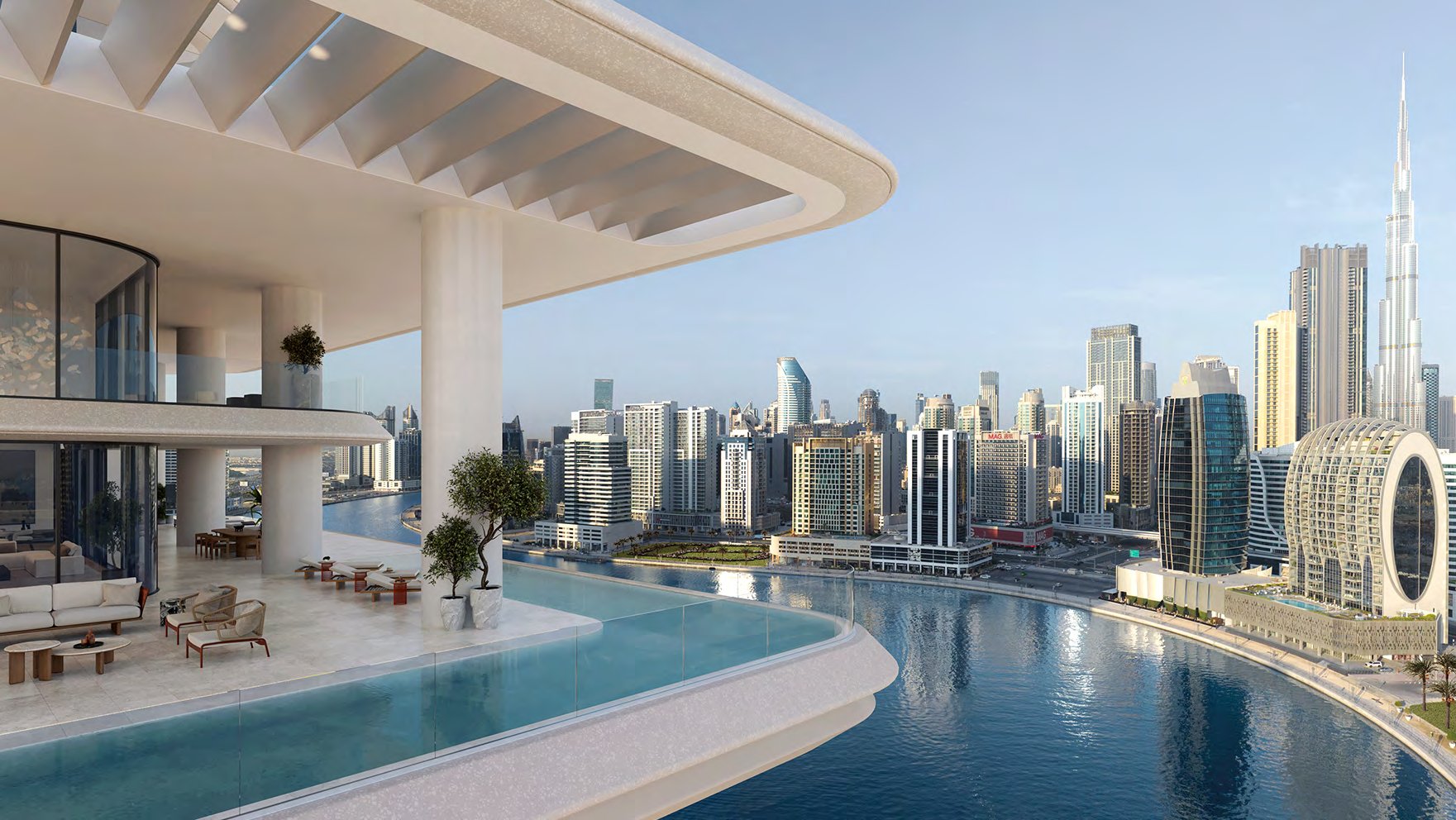 Terrace with infinity pool overlooking Marasi Bay and the Burj Khalifa